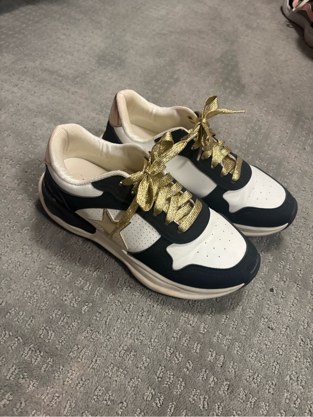 Women’s White and Black Fashion Sneakers with Gold Accents